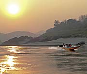 A Speedboat on the Mekong River by Asienreisender